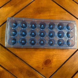 New blue ice cube tray by Progressive International Corp. for use with straws